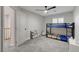 Bedroom with a bunk bed, plush chair, and a ceiling fan at 11157 Mezzana St, Las Vegas, NV 89141