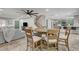 Open-concept living space includes a dining area, living room, and kitchen, perfect for entertaining and Gathering gatherings at 11157 Mezzana St, Las Vegas, NV 89141