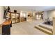 Spacious basement with a wine cellar, flat screen television and a stepped seating area with a sectional couch at 2 Cerchio Centrale, Henderson, NV 89011