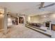 Finished basement featuring a stepped seating area with a sectional couch, recessed lighting, and a bar area at 2 Cerchio Centrale, Henderson, NV 89011