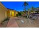 Inviting front entrance featuring desert landscaping, a walkway, and a charming exterior at 2 Cerchio Centrale, Henderson, NV 89011