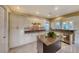 Well-equipped kitchen features a center island, granite countertops, and ample storage at 2 Cerchio Centrale, Henderson, NV 89011