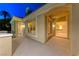 Expansive covered patio with exterior archways providing seamless indoor-outdoor living and dining at 2 Cerchio Centrale, Henderson, NV 89011