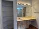 Bathroom vanity and linen closet at 2118 Chapman Ranch Dr, Henderson, NV 89012