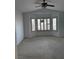 Bright bedroom with a bay window and ceiling fan at 2118 Chapman Ranch Dr, Henderson, NV 89012