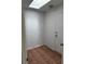 Small bonus room offers tile flooring and a skylight for natural light at 2118 Chapman Ranch Dr, Henderson, NV 89012