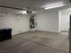 Well-lit garage features a water heater and ample open space at 2118 Chapman Ranch Dr, Henderson, NV 89012