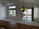 Inviting living room with large windows and sliding glass doors leading to the outdoor space at 2118 Chapman Ranch Dr, Henderson, NV 89012
