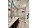 Bathroom with double vanity, decorative accents, and tile floors at 2204 Valdina St, Henderson, NV 89044