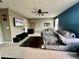 Bedroom featuring carpet, a ceiling fan and natural light at 2204 Valdina St, Henderson, NV 89044