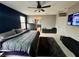 Bedroom with a large bed, mounted television, and carpet at 2204 Valdina St, Henderson, NV 89044