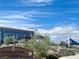 Entrance to Capriola Park with landscaped greenery and a modern building in the background at 2204 Valdina St, Henderson, NV 89044