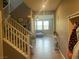 Welcoming foyer showcasing staircase and entry to the spacious main living area at 2204 Valdina St, Henderson, NV 89044
