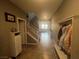 Inviting foyer with tile flooring leading to the staircase and living area at 2204 Valdina St, Henderson, NV 89044