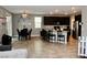 The kitchen with dark cabinets, stainless steel appliances and connected dining area at 2204 Valdina St, Henderson, NV 89044