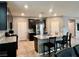 Open concept kitchen with stainless steel appliances and granite countertops at 2204 Valdina St, Henderson, NV 89044