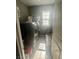 Functional laundry room with modern washer and dryer set next to a bright window at 2204 Valdina St, Henderson, NV 89044