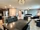 Open living room concept with kitchen and dining area, great for entertaining at 2204 Valdina St, Henderson, NV 89044
