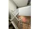 Staircase with white railing leading to the upper level at 2204 Valdina St, Henderson, NV 89044