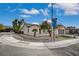 Corner lot featuring drought-tolerant landscaping, a gated courtyard, and a well-maintained facade for street appeal at 2603 Savannah Springs Ave, Henderson, NV 89052