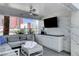 Stylish balcony featuring comfortable seating, outdoor TV, and city views at 2700 Las Vegas Blvd # 1002, Las Vegas, NV 89109
