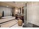 Spacious bathroom featuring a soaking tub, shower, and double sinks at 2700 Las Vegas Blvd # 1002, Las Vegas, NV 89109