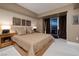Stylish bedroom featuring a comfortable king bed, city views, and tasteful decor at 2700 Las Vegas Blvd # 1002, Las Vegas, NV 89109