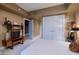 Well-lit bedroom featuring a large closet, minimalist decor, and comfortable furnishings at 2700 Las Vegas Blvd # 1002, Las Vegas, NV 89109