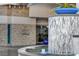Elegant Sky Las Vegas building entrance with stone accents and water feature at 2700 Las Vegas Blvd # 1002, Las Vegas, NV 89109
