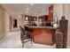 Modern kitchen featuring a breakfast bar, stainless steel appliances, and elegant finishes at 2700 Las Vegas Blvd # 1002, Las Vegas, NV 89109