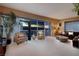 Beautiful living room with floor to ceiling windows overlooking a magnificent sunset and city view at 2700 Las Vegas Blvd # 1002, Las Vegas, NV 89109