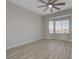 Bright bedroom features wood-look floors, a ceiling fan, and a bay window that provides lots of natural light at 2820 Thunder Bay Ave, Henderson, NV 89052