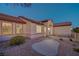 Attractive single-story home with desert landscaping and a well-manicured lawn at 2820 Thunder Bay Ave, Henderson, NV 89052