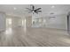 Bright and open living room featuring wood floors, modern ceiling fan and an open concept floorplan at 2820 Thunder Bay Ave, Henderson, NV 89052