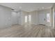 Open-concept living area with stylish wood floors, front door, and neutral color palette at 2820 Thunder Bay Ave, Henderson, NV 89052