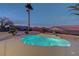 Twilight view of the pool area showcasing its tranquil ambiance and sparkling water at 2820 Thunder Bay Ave, Henderson, NV 89052