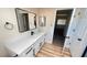 Bathroom featuring modern vanity with sleek fixtures and framed mirrors at 2851 S Valley View Blvd # 1153, Las Vegas, NV 89102