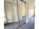 Bedroom showcases a closet with mirrored sliding doors and neutral walls at 2851 S Valley View Blvd # 1153, Las Vegas, NV 89102