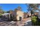 Side view of home with desert landscaping, stone facade, and walkway at 2851 S Valley View Blvd # 1153, Las Vegas, NV 89102
