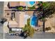 Overhead view of a home featuring a pool, patio, RV parking, and a well-kept yard in a friendly neighborhood at 3083 Paintedhills Ave, Las Vegas, NV 89120
