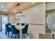 Elegant dining room with seating for six, custom built-in cabinets, and a sliding glass door at 3083 Paintedhills Ave, Las Vegas, NV 89120
