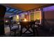 Stylish patio with a shaded seating area and a fire pit centerpiece, great for evening gatherings at 3083 Paintedhills Ave, Las Vegas, NV 89120
