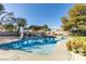 Backyard pool surrounded by an expansive area of concrete, perfect for cooling off on a hot day at 3083 Paintedhills Ave, Las Vegas, NV 89120