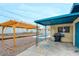 Backyard with a pergola, gravel landscaping and space for grilling next to a swimming pool at 3247 Greenbriar Dr, Las Vegas, NV 89121