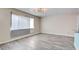 Bright living area featuring modern flooring and an open layout, perfect for entertaining at 3247 Greenbriar Dr, Las Vegas, NV 89121