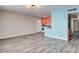Spacious living area showcasing modern flooring and an open layout to the kitchen at 3247 Greenbriar Dr, Las Vegas, NV 89121
