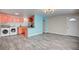 Open living space with stylish flooring connecting the living area to the kitchen at 3247 Greenbriar Dr, Las Vegas, NV 89121
