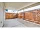 Covered patio with a wooden fence, providing an outdoor area for relaxation and privacy at 3247 Greenbriar Dr, Las Vegas, NV 89121