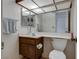 Cozy bathroom featuring a vanity with an overhanging mirror and toilet at 3301 China Dr, Las Vegas, NV 89121