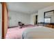 Bright bedroom with plush carpeting, neutral walls, and ample closet space at 3301 China Dr, Las Vegas, NV 89121